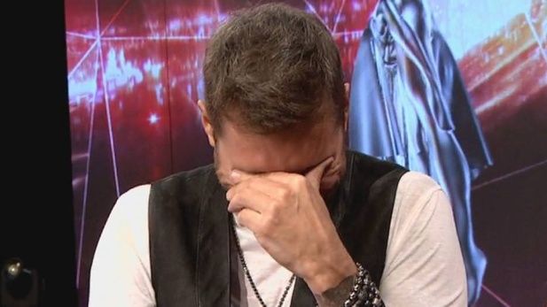 tinelli llorando